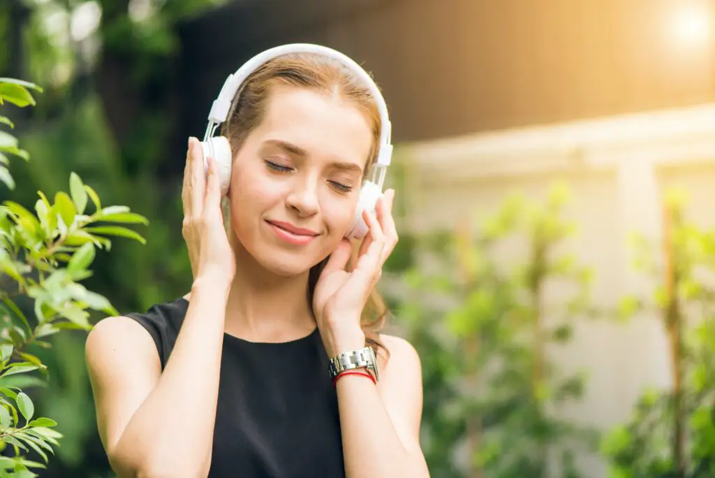 Woman listening to relaxing music